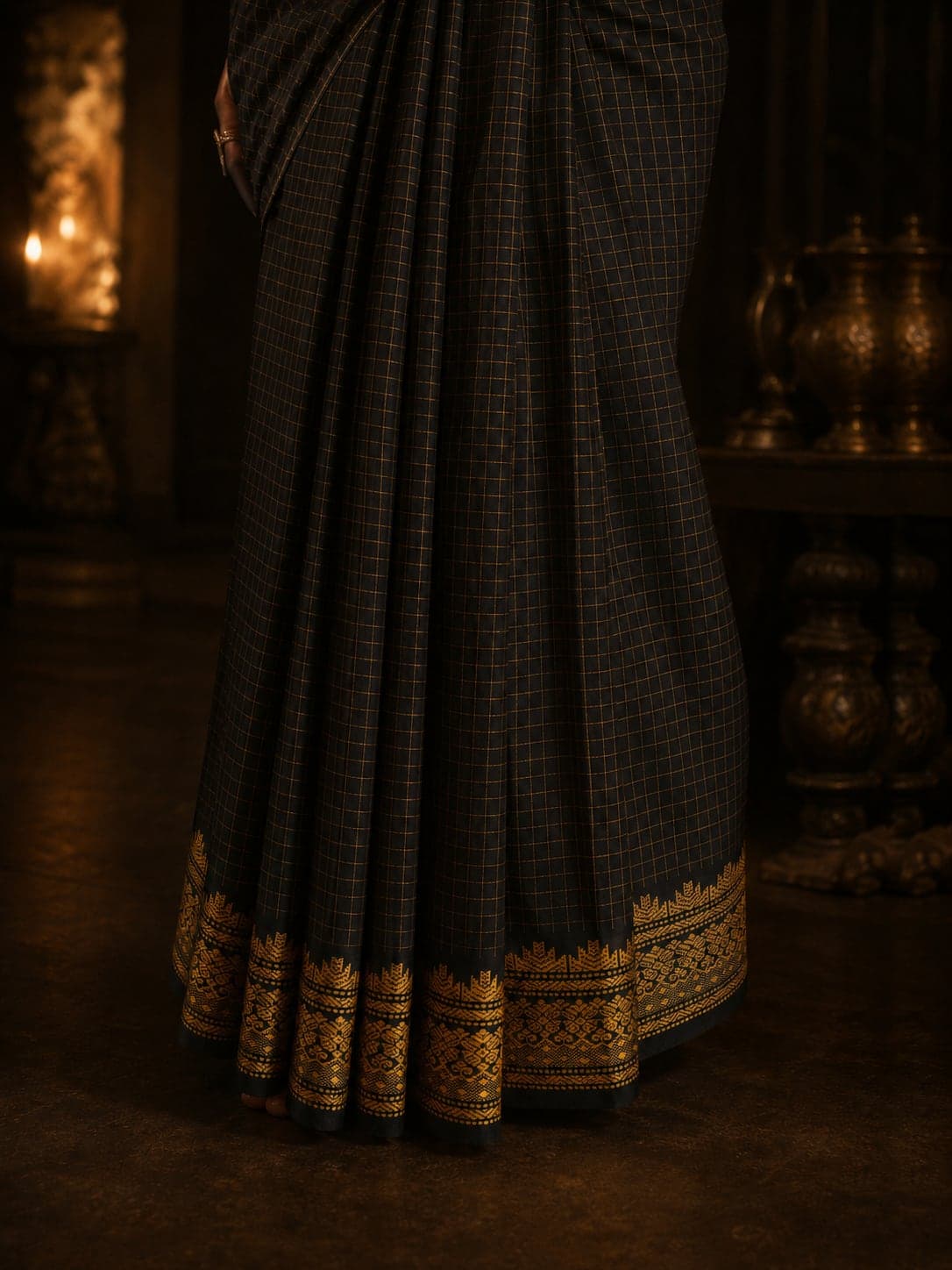 AI-generated catalogue detail showing the saree pleats and gold woven border.